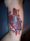 love pain image tattoo on arm